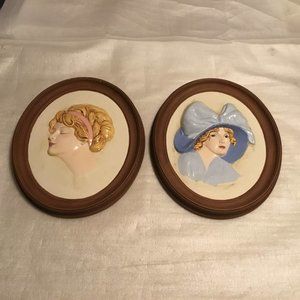 Set of two hand-painted Erma Gilliand Duncan ceramic cameo-like wall plaques